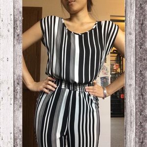 Bebe stripped jumpsuit
